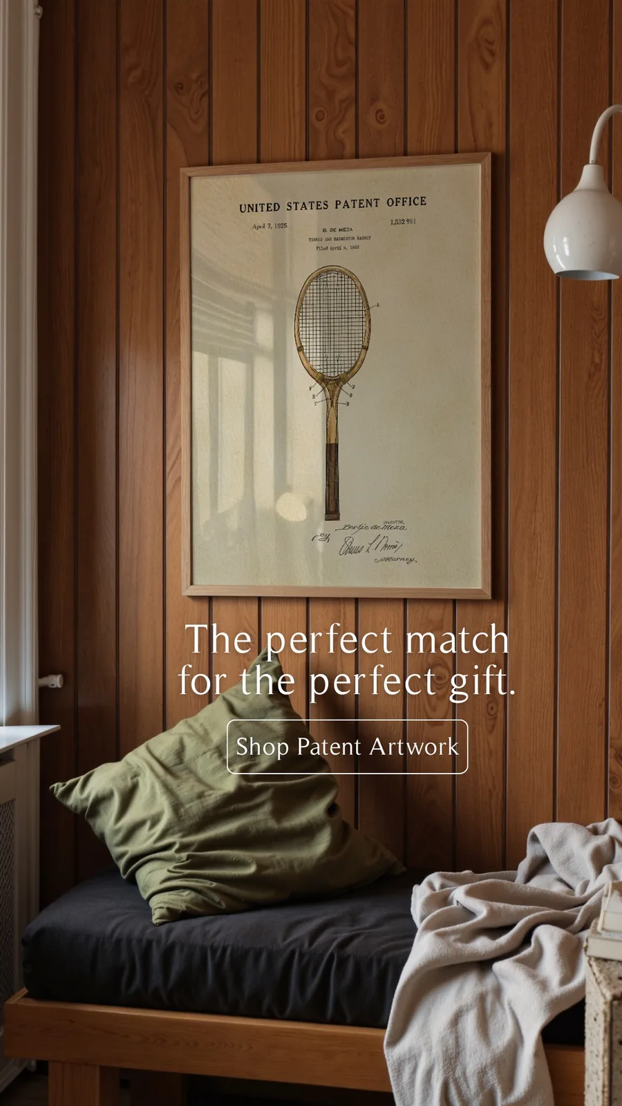 Vintage tennis racket patent artwork displayed in a warm wood-paneled room